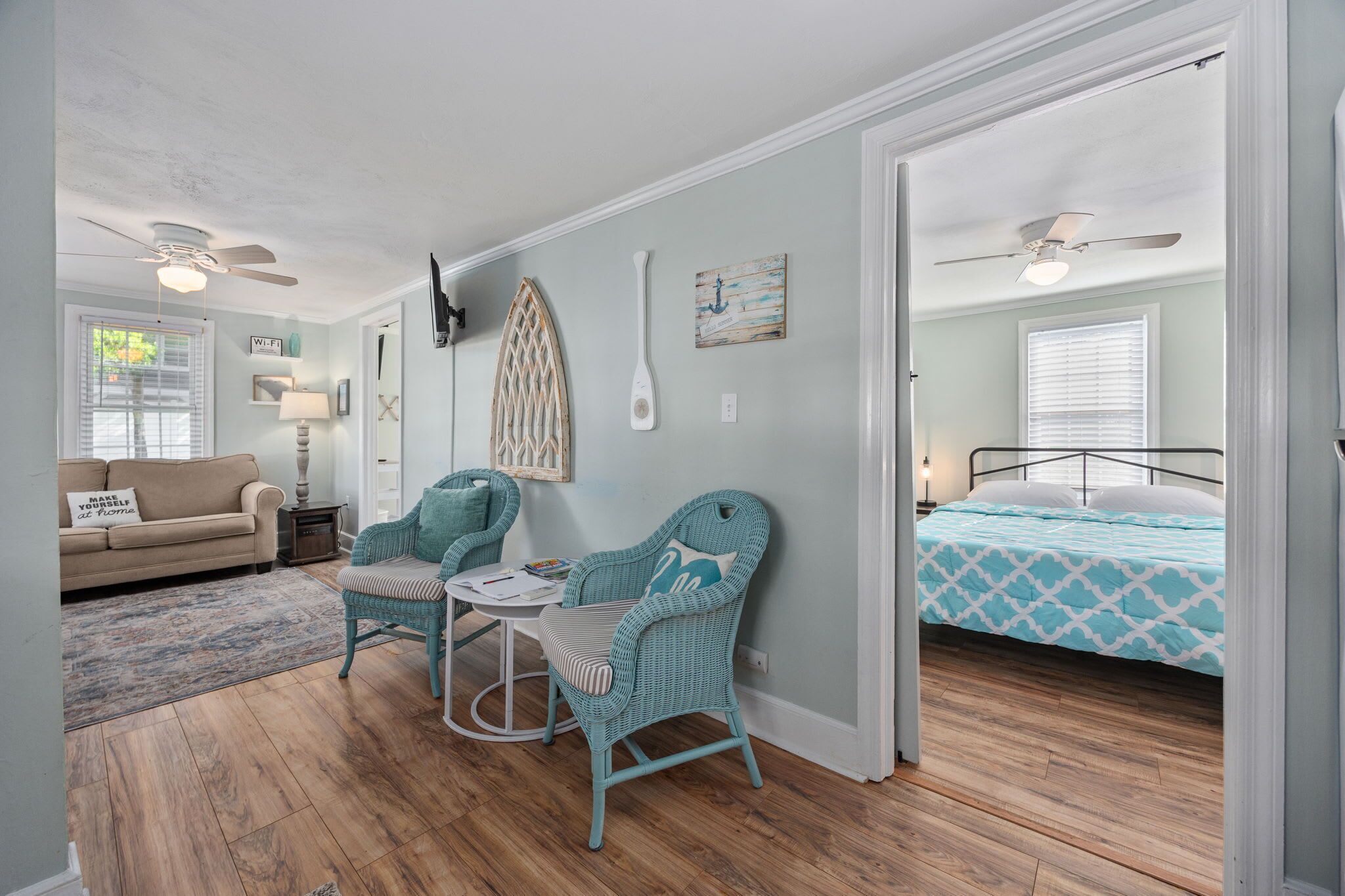 Bright and inviting entry with a seating nook to kick off your coastal stay!