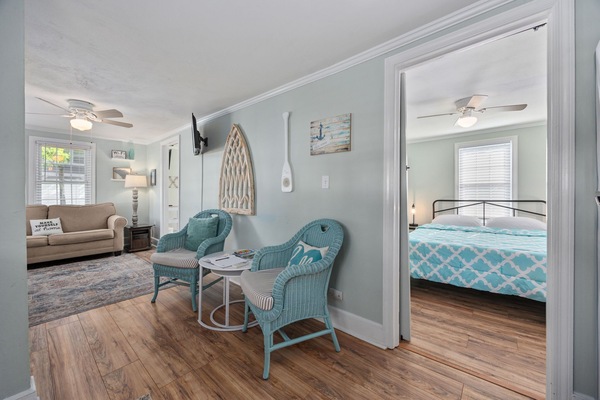 Bright and inviting entry with a seating nook to kick off your coastal stay!