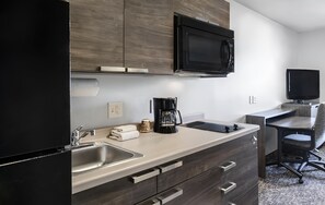 Fridge, microwave, stovetop, coffee/tea maker
