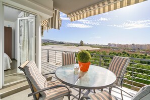 Outdoor dining - Apartment 'Sea and Mountain Views' with Sea View, Shared Pool, and AC (Torrox)