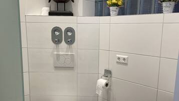 Hair dryer, towels, soap, toilet paper