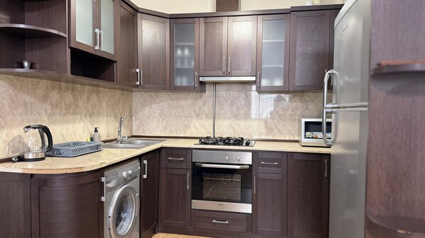 Deluxe Apartment, 2 Bedrooms, Balcony, City View | Private kitchen | Coffee/tea maker, electric kettle