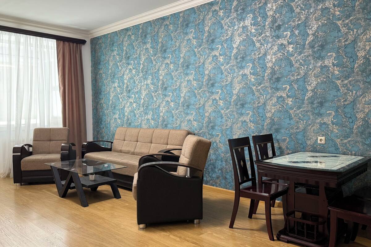 Deluxe Apartment, 2 Bedrooms, Balcony, City View | Living area | Smart TV