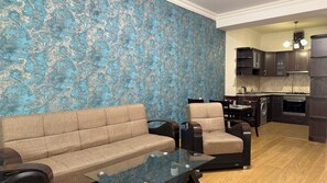Deluxe Apartment, 2 Bedrooms, Balcony, City View | Living area | Smart TV