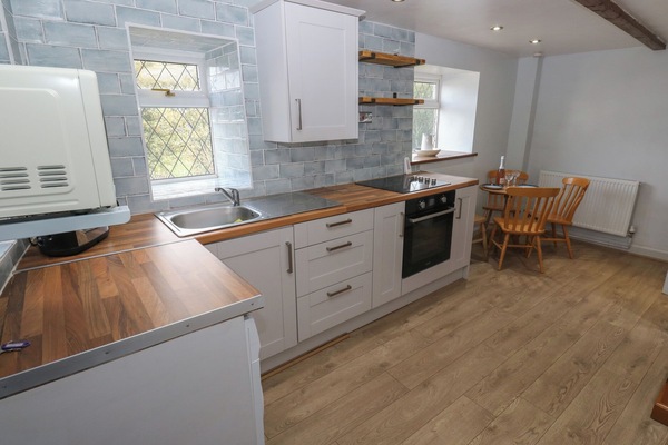 Fridge, microwave, toaster, cookware/dishes/utensils