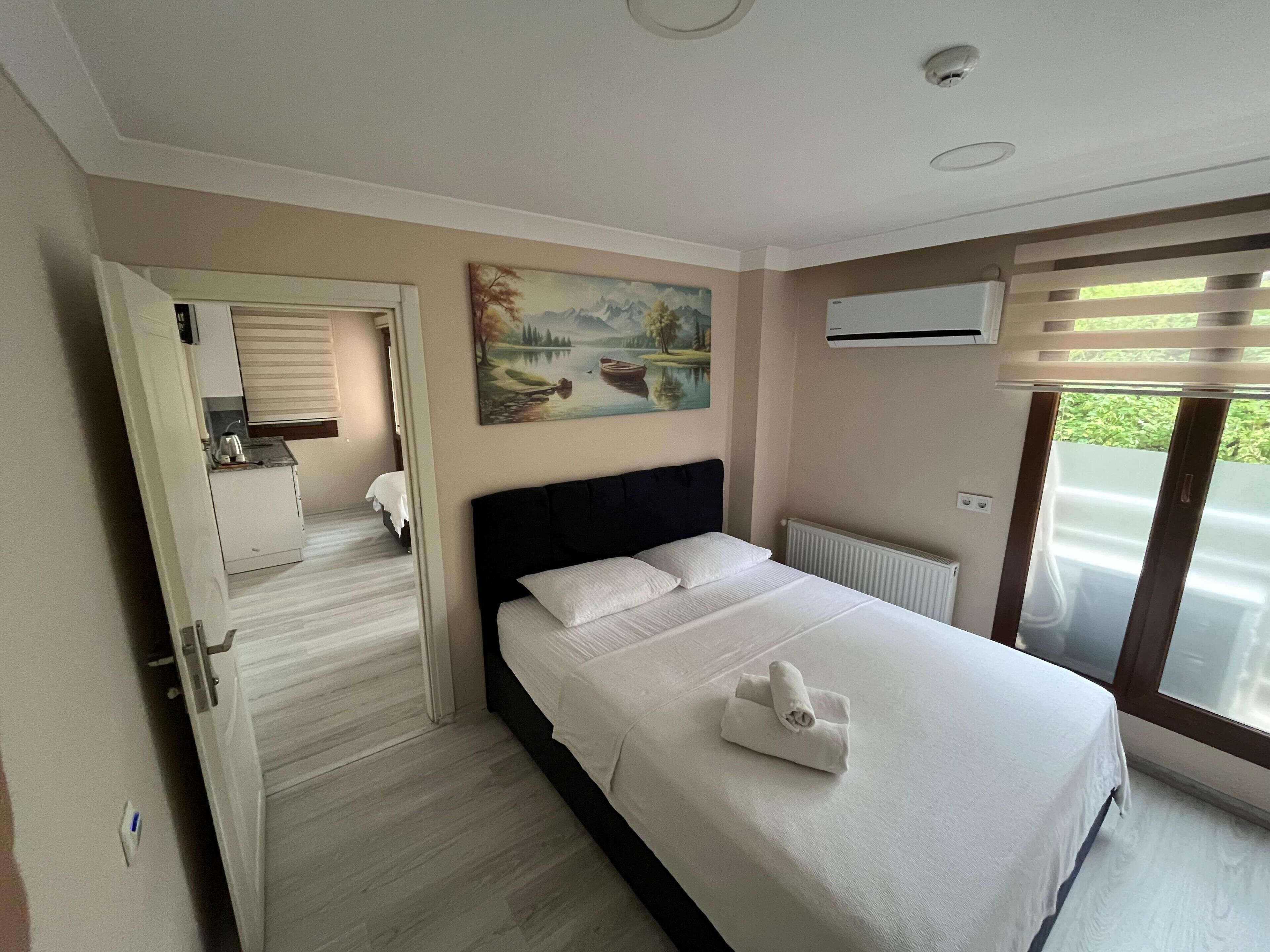 Family Quadruple Room, Balcony, Garden View | Private kitchen