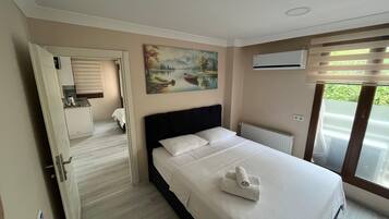 Family Quadruple Room, Balcony, Garden View | Private kitchen