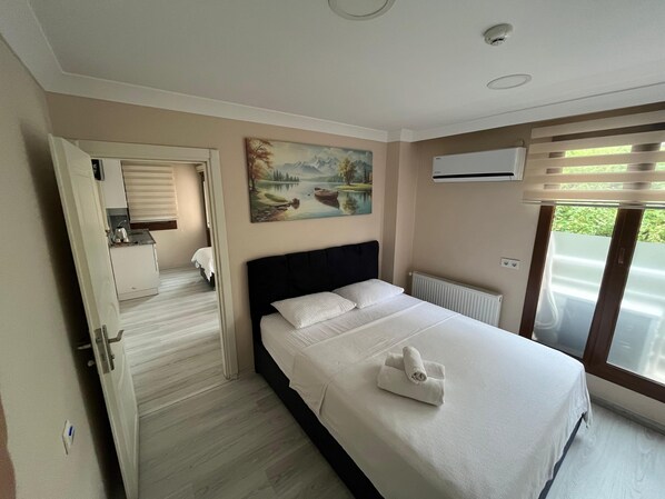 Family Quadruple Room, Balcony, Garden View | Private kitchen