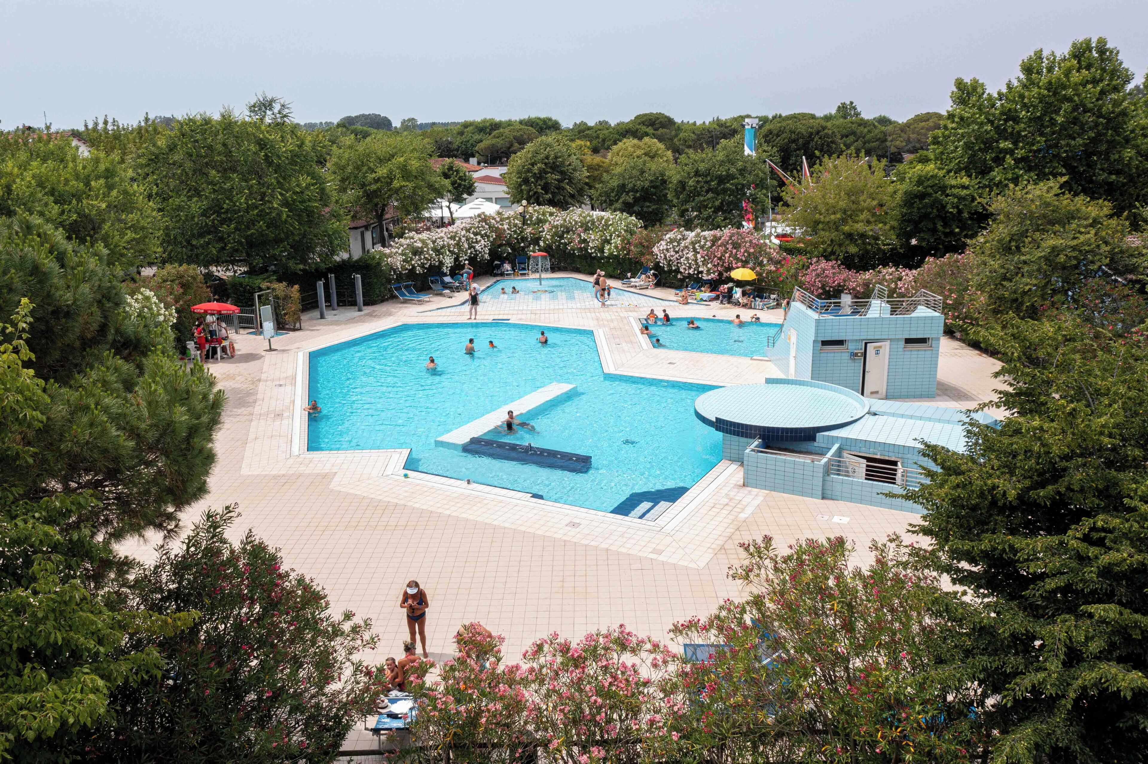 Seasonal outdoor pool, pool umbrellas, pool loungers