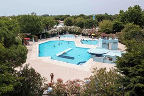 Seasonal outdoor pool, pool umbrellas, pool loungers