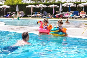 Seasonal outdoor pool, pool umbrellas, sun loungers
