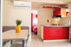 Premium Mobile Home, Garden View | Living area | TV