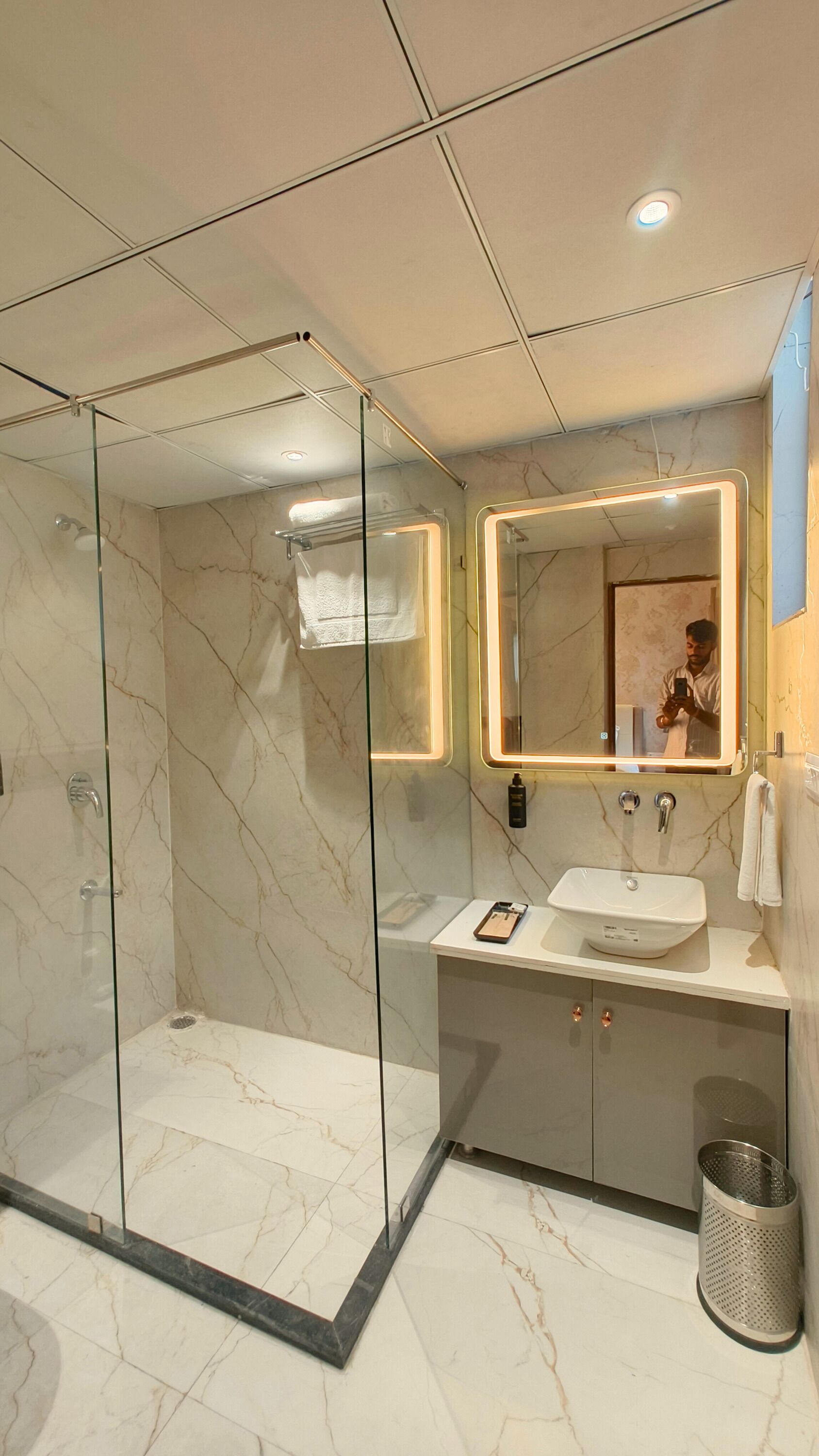 Shower, towels, soap, toilet paper