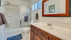 A bathroom with a shower, toilet, sink, and mirror. - Tahoe condo across from Heavenly Stagecoach Lodge- (Stateline)