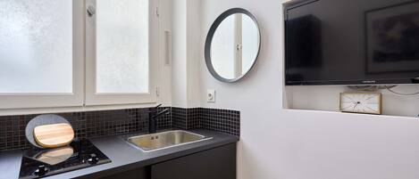 Departamento | Cocina privada | Refrigerador, microondas, cafetera y tetera y tetera eléctrica