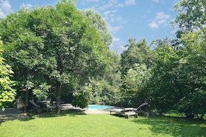 Seasonal outdoor pool, pool loungers
