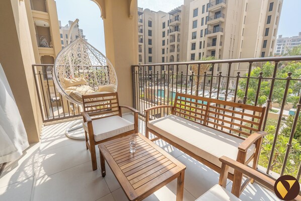 Apartment, Balcony, Pool View | Iron/ironing board, free WiFi