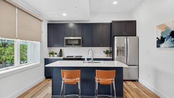 Apartment, 2 Bedrooms | Private kitchen | Fridge, oven, coffee/tea maker