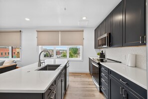 Apartment, 2 Bedrooms | Private kitchen | Fridge, oven, coffee/tea maker - Stylish Downtown Unit With Historic Charm 2 Bedroom Apts (Bloomington)