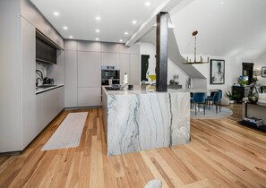 Condo, 4 Bedrooms | Private kitchen | Fridge, oven, coffee/tea maker, toaster