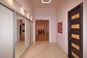 Apartment, 4 Bedrooms, Balcony, City View | Living area