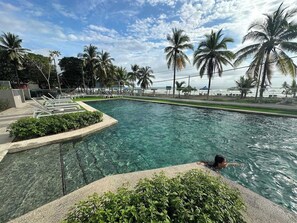 Pool - Pacific Point Condos offer a comfortable and modern stay in Jacó, featuring a peaceful setting just minutes from the beach. With convenient amenities, secure access, and a great location near restaurants and shops. (Jaco Beach)