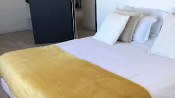 2 dormitoris i roba de llit