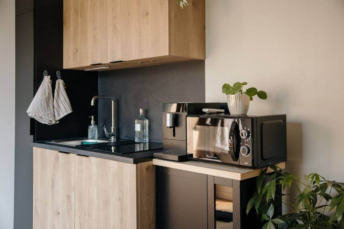 Fridge, microwave, cookware/dishes/utensils