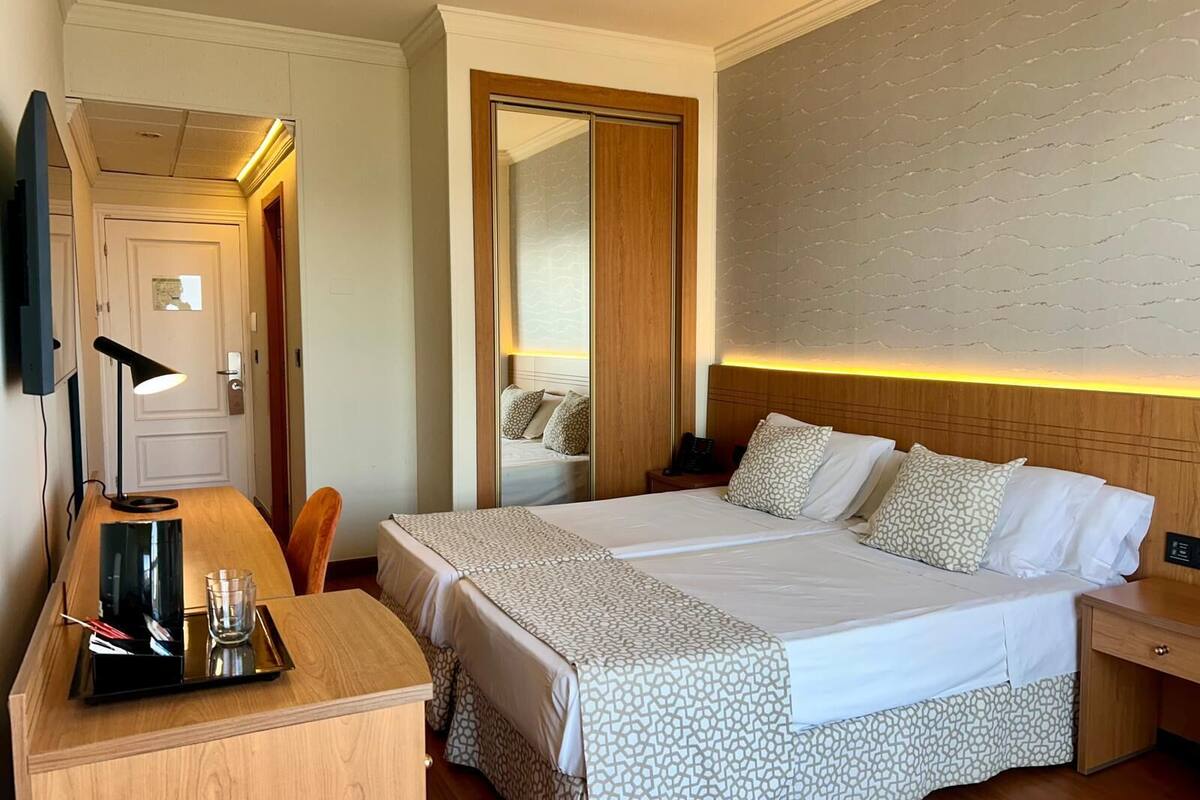 Double Room, Balcony | In-room safe, desk, free WiFi, bed sheets