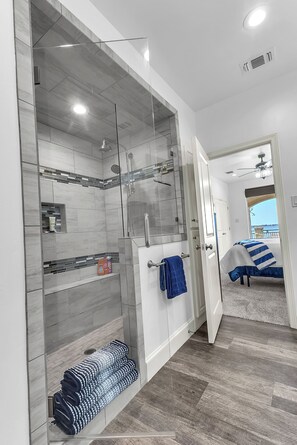 Shower, towels, soap, toilet paper