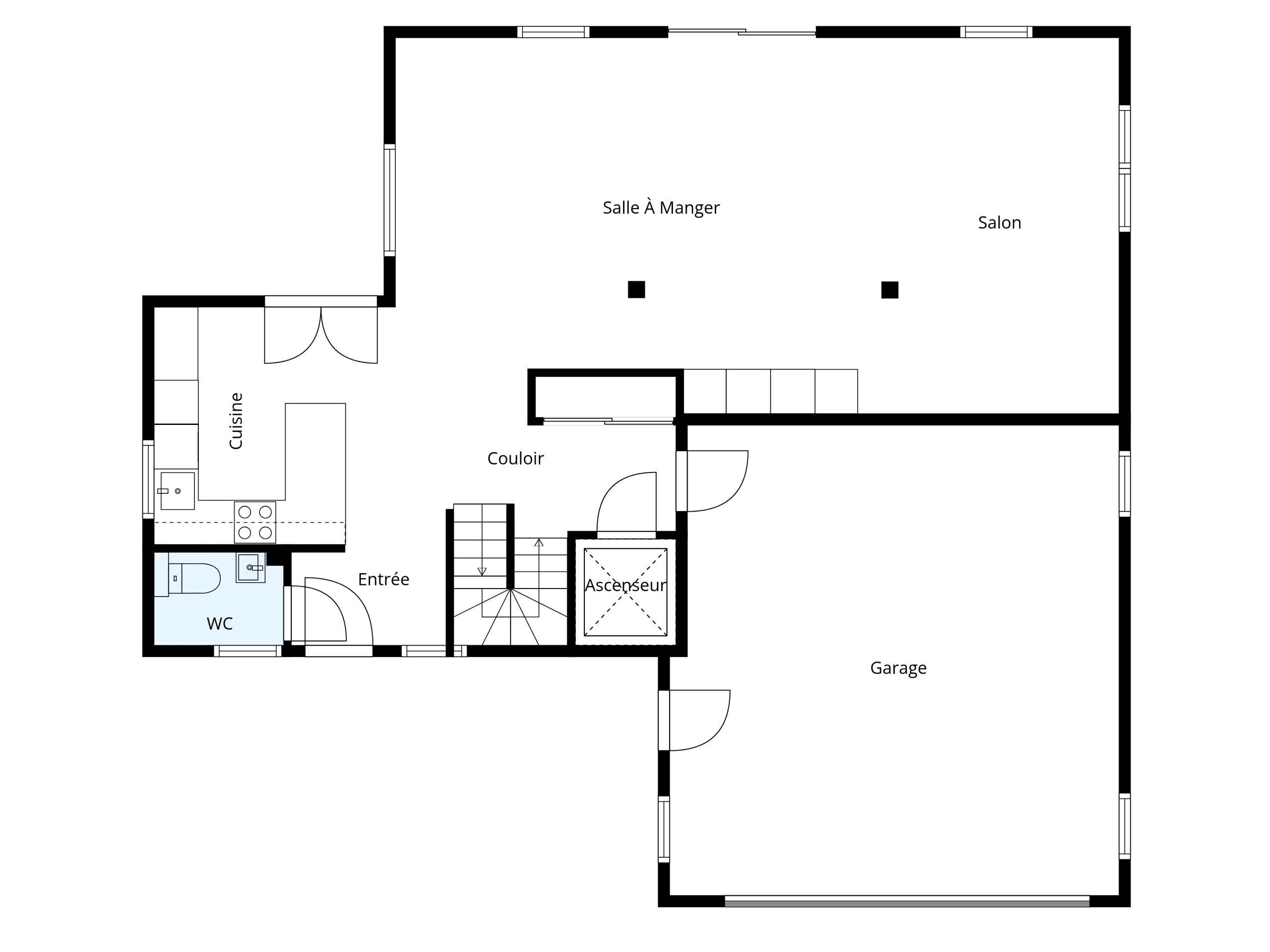 Un plano de planta que muestra una cocina, comedor, baño y garaje.