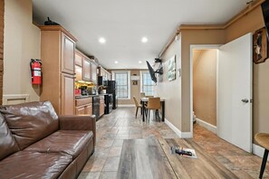 TV, fireplace, books, offices - Charming Home in Vibrant Philadelphia (Philadelphia)