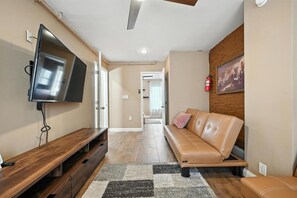 TV, fireplace, books, offices