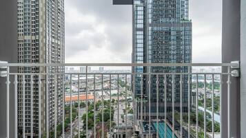 Luxury Apartment, 3 Bedrooms, Balcony, City View | Minibar, desk, blackout drapes, iron/ironing board