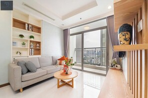 Appartement Deluxe, 2 chambres, vue ville | Coin séjour