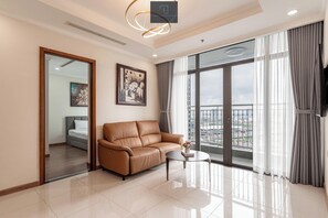 Luxury Apartment, 3 Bedrooms, Balcony, City View | Minibar, desk, blackout drapes, iron/ironing board - The Landmark Residence Of Central City (Ho Chi Minh)