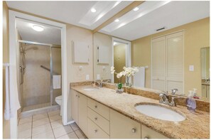 Shower, hair dryer, towels, soap