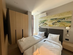 2 habitaciones, tabla de planchar con plancha, wifi y ropa de cama