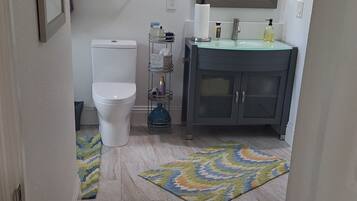 Hair dryer, towels, soap, toilet paper