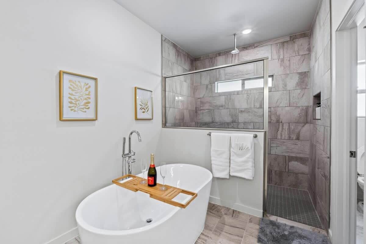 Shower, hair dryer, towels, shampoo