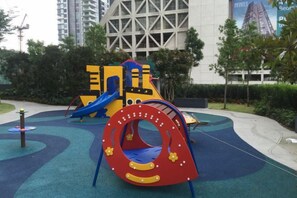 A playground with a slide and a tunnel. - Mcity Jalan Ampang, KLCC (Kuala Lumpur)