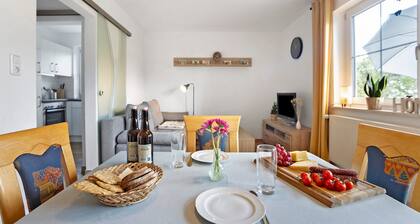 Ferienwohnung 'Am Mühlbach' mit Gemeinschaftsgarten, Balkon und WLAN