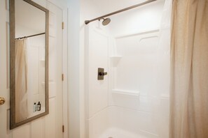 Shower, towels, soap, toilet paper