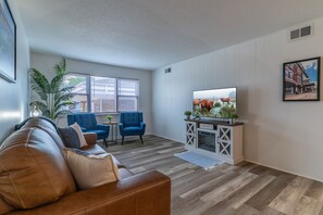 Living area - Charming 1-bedroom apartment in historic downtown Cedar Falls with AC. (Cedar Falls)