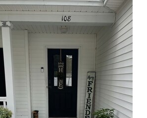 Exterior detail - Breezy 5-Bed Home with Walk-In Closets, Fenced Yard, Lagoon View, and Utilities (Bluffton)