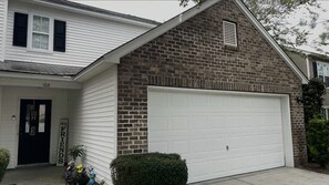 Exterior detail - Breezy 5-Bed Home with Walk-In Closets, Fenced Yard, Lagoon View, and Utilities (Bluffton)