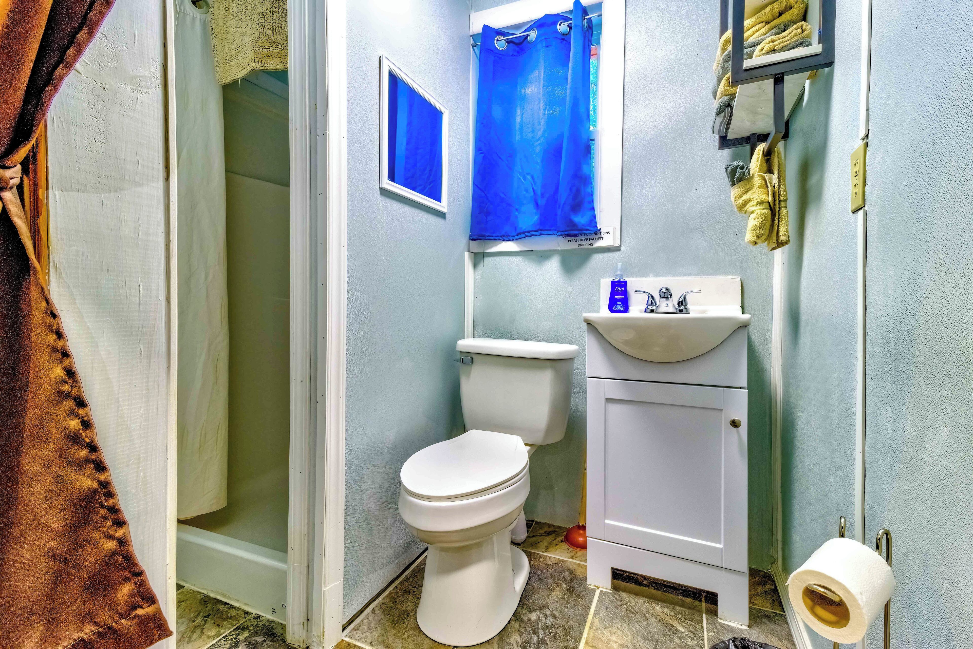 Shower, towels, soap, toilet paper