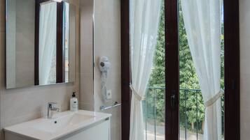 Hair dryer, towels, soap, toilet paper