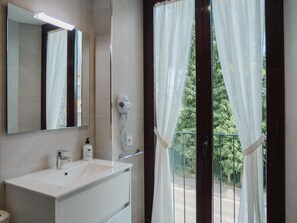 Hair dryer, towels, soap, toilet paper