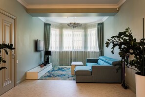 Chambre Double Luxe, vue montagne | Salle de séjour